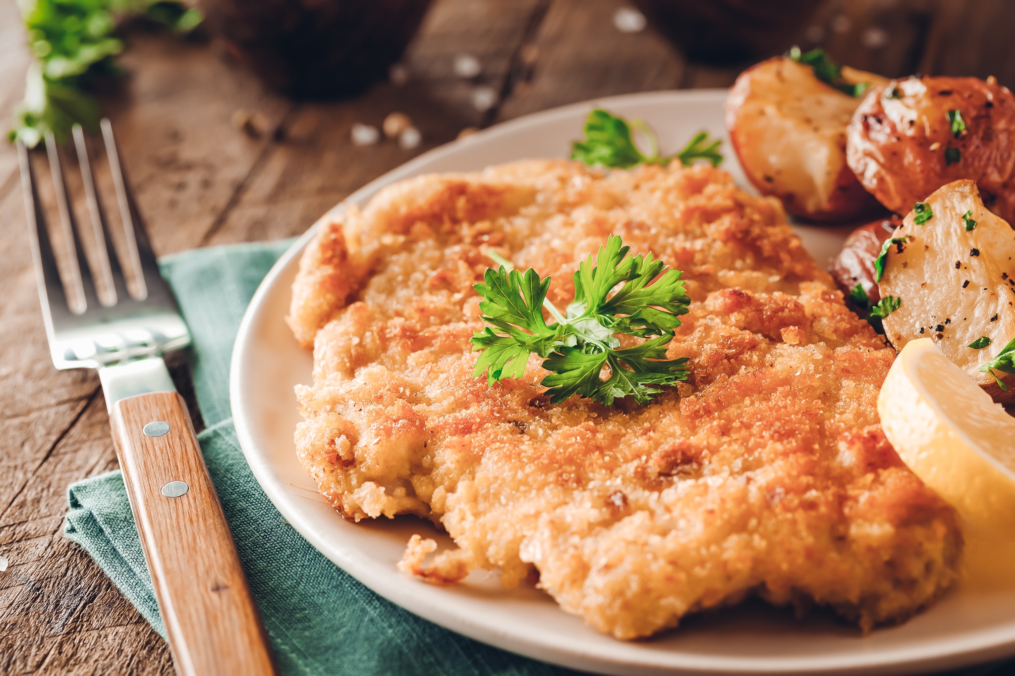 Panaden- auf diesem Bild sieht man ein paniertes Schnitzel